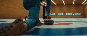 Movie still from “Bally - Curling” (2022), directed by Marie Schüller – Medium shot, Low angle