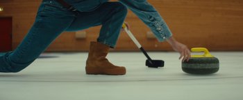 Movie still from “Bally - Curling” (2022), directed by Marie Schüller – Medium shot, Low angle