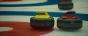 Movie still from “Bally - Curling” (2022), directed by Marie Schüller – Extreme Close Up shot, High angle