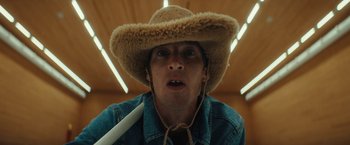 Movie still from “Bally - Curling” (2022), directed by Marie Schüller – Close Up shot, Low angle