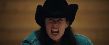 Movie still from “Bally - Curling” (2022), directed by Marie Schüller – Close Up shot, Low angle