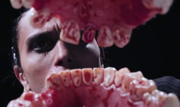 Movie still from “João Borsch - Apaz” (2023), directed by Inês Aires – Extreme Close Up shot, Overhead angle