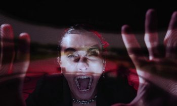 Movie still from “João Borsch - Apaz” (2023), directed by Inês Aires – Extreme Close Up shot, Low angle