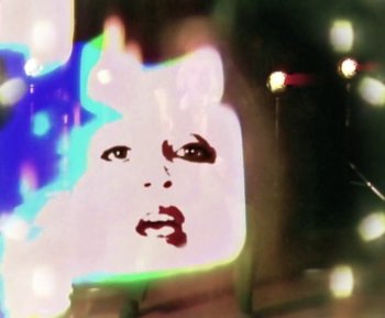 Movie still from “St. Vincent - Pay Your Way In Pain” (2021), directed by Bill Benz – Extreme Close Up shot, Low angle