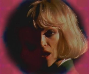 Movie still from “St. Vincent - Pay Your Way In Pain” (2021), directed by Bill Benz – Extreme Close Up shot, Low angle