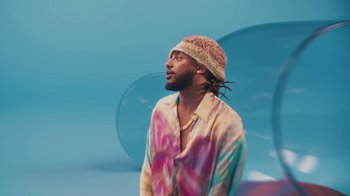 Movie still from “KAYTRAMINÉ feat. Pharrell Williams - 4EVA” (2023), directed by Jack Begert – Medium shot, Low angle