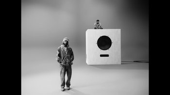 Movie still from “KAYTRAMINÉ feat. Pharrell Williams - 4EVA” (2023), directed by Jack Begert – Wide shot, Low angle