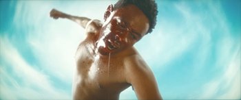 Movie still from “Tyler, The Creator - SORRY NOT SORRY” (2023), directed by Tyler Okonma – Extreme Close Up shot, Overhead angle