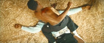 Movie still from “Tyler, The Creator - SORRY NOT SORRY” (2023), directed by Tyler Okonma – Medium shot, Overhead angle