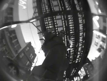 Movie still from “Beastie Boys - An Open Letter To NYC” (2004), directed by Adam Yauch – Extreme Close Up shot, Overhead angle