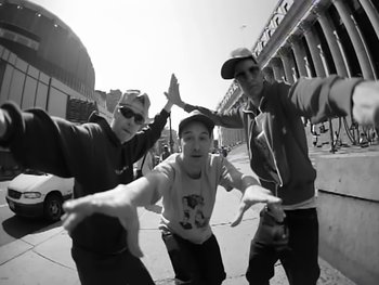 Movie still from “Beastie Boys - An Open Letter To NYC” (2004), directed by Adam Yauch – Medium shot, Low angle
