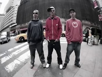 Movie still from “Beastie Boys - An Open Letter To NYC” (2004), directed by Adam Yauch – Medium shot, Low angle