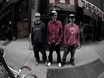 Movie still from “Beastie Boys - An Open Letter To NYC” (2004), directed by Adam Yauch – Wide shot, Low angle