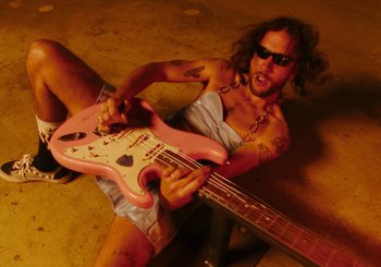 Movie still from “Miel De Montagne - Le Pigeon” (2023), directed by Morgan Jouquand – Medium shot, Overhead angle