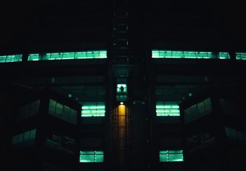 Movie still from “AJ Tracey - Wifey Riddim 4” (2024), directed by Late Milk – Extreme Wide shot, Low angle