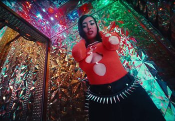 Movie still from “AJ Tracey - Wifey Riddim 4” (2024), directed by Late Milk – Medium shot, Low angle