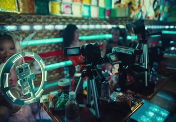 Movie still from “AJ Tracey - Wifey Riddim 4” (2024), directed by Late Milk – Extreme Close Up shot, High angle