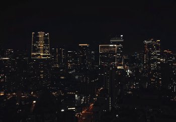 Movie still from “AJ Tracey - Wifey Riddim 4” (2024), directed by Late Milk – Extreme Wide shot, High angle