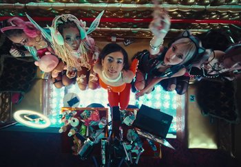 Movie still from “AJ Tracey - Wifey Riddim 4” (2024), directed by Late Milk – Wide shot, Overhead angle