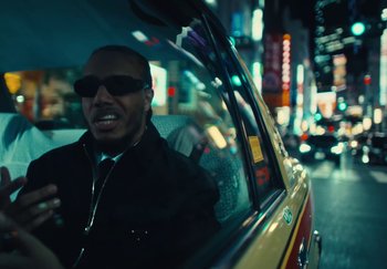 Movie still from “AJ Tracey - Wifey Riddim 4” (2024), directed by Late Milk – Close Up shot, Low angle