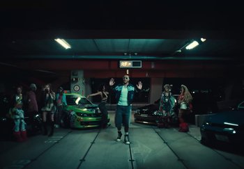 Movie still from “AJ Tracey - Wifey Riddim 4” (2024), directed by Late Milk – Wide shot, High angle