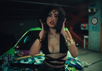 Movie still from “AJ Tracey - Wifey Riddim 4” (2024), directed by Late Milk – Medium shot, Low angle