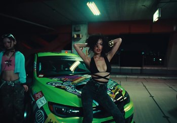 Movie still from “AJ Tracey - Wifey Riddim 4” (2024), directed by Late Milk – Medium shot, Low angle