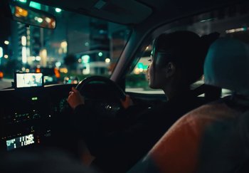 Movie still from “AJ Tracey - Wifey Riddim 4” (2024), directed by Late Milk – Close Up shot, Over the shoulder angle