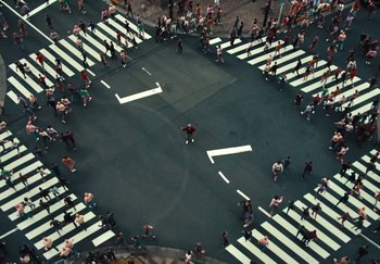 Movie still from “AJ Tracey - Wifey Riddim 4” (2024), directed by Late Milk – Extreme Wide shot, Overhead angle