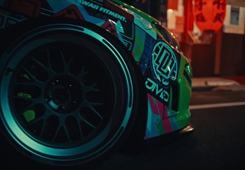 Movie still from “AJ Tracey - Wifey Riddim 4” (2024), directed by Late Milk – Wide shot, Low angle