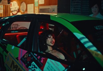 Movie still from “AJ Tracey - Wifey Riddim 4” (2024), directed by Late Milk – Medium shot, Low angle