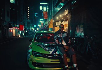 Movie still from “AJ Tracey - Wifey Riddim 4” (2024), directed by Late Milk – Wide shot, Low angle