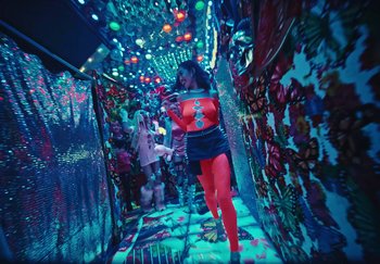 Movie still from “AJ Tracey - Wifey Riddim 4” (2024), directed by Late Milk – Wide shot, High angle