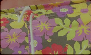 Movie still from “Nu Genea with Célia Kameni - Marechià” (2021), directed by Guido Lombardi – Extreme Close Up shot, Overhead angle