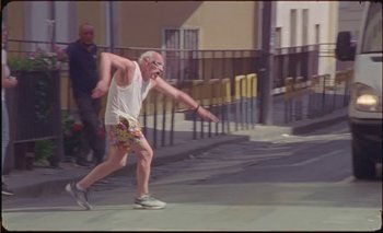 Movie still from “Nu Genea with Célia Kameni - Marechià” (2021), directed by Guido Lombardi – Wide shot, Low angle