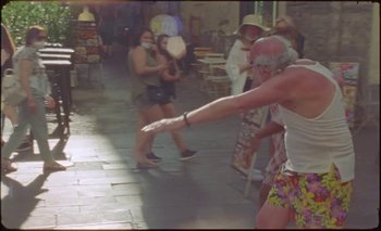 Movie still from “Nu Genea with Célia Kameni - Marechià” (2021), directed by Guido Lombardi – Wide shot, Low angle