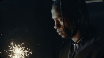 Movie still from “Travis Scott - I KNOW ?” (2024), directed by Travis Scott – Close Up shot, Low angle