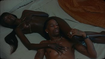 Movie still from “Travis Scott - I KNOW ?” (2024), directed by Travis Scott – Medium shot, High angle