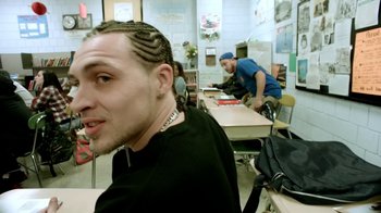 Movie still from “Joyner Lucas - Ross Capicchioni” (2015), directed by Motion Family – Close Up shot, Over the shoulder angle