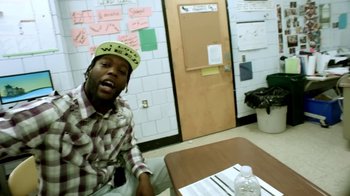 Movie still from “Joyner Lucas - Ross Capicchioni” (2015), directed by Motion Family – Medium shot, Over the shoulder angle