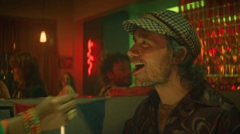 Movie still from “Valaire feat. Alan Prater - (She's a) Winner” (2023), directed by Vallée Duhamel – Close Up shot, Low angle