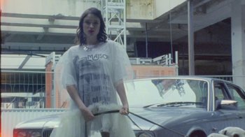 Movie still from “Lolo Zouaï - Moi + Look at Us” (2020), directed by Piotr Lebryk – Medium shot, Low angle