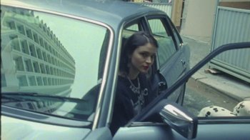 Movie still from “Lolo Zouaï - Moi + Look at Us” (2020), directed by Piotr Lebryk – Close Up shot, High angle