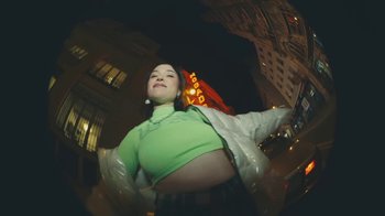 Movie still from “Lolo Zouaï - Moi + Look at Us” (2020), directed by Piotr Lebryk – Medium shot, Low angle