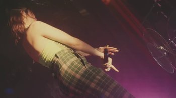 Movie still from “Lolo Zouaï - Moi + Look at Us” (2020), directed by Piotr Lebryk – Medium shot, Low angle