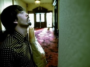 Movie still from “Foo Fighters - Monkey Wrench” (2009), directed by Dave Grohl – Close Up shot, Overhead angle