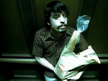 Movie still from “Foo Fighters - Monkey Wrench” (2009), directed by Dave Grohl – Medium shot, High angle