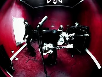 Movie still from “Foo Fighters - Monkey Wrench” (2009), directed by Dave Grohl – Wide shot, Overhead angle