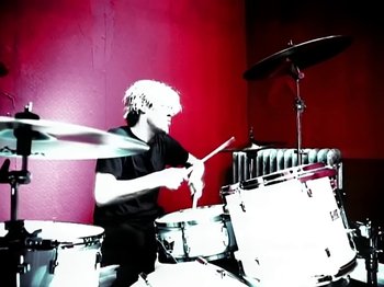 Movie still from “Foo Fighters - Monkey Wrench” (2009), directed by Dave Grohl – Medium shot, Low angle