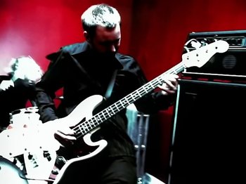 Movie still from “Foo Fighters - Monkey Wrench” (2009), directed by Dave Grohl – Medium shot, Low angle